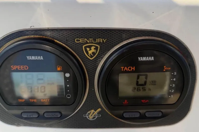 Slide: The Image of Dashboard of a 2007 Century 2102 Inshore boat with Yamaha speed and tachometer gauges. - 4