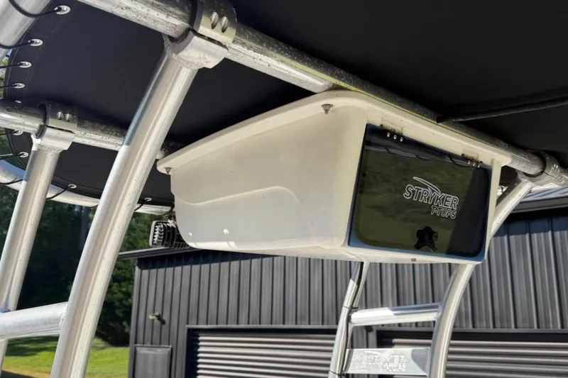 Slide: The Image of T-top storage box on a 2007 Century 2102 Inshore boat with Stryker branding. - 5