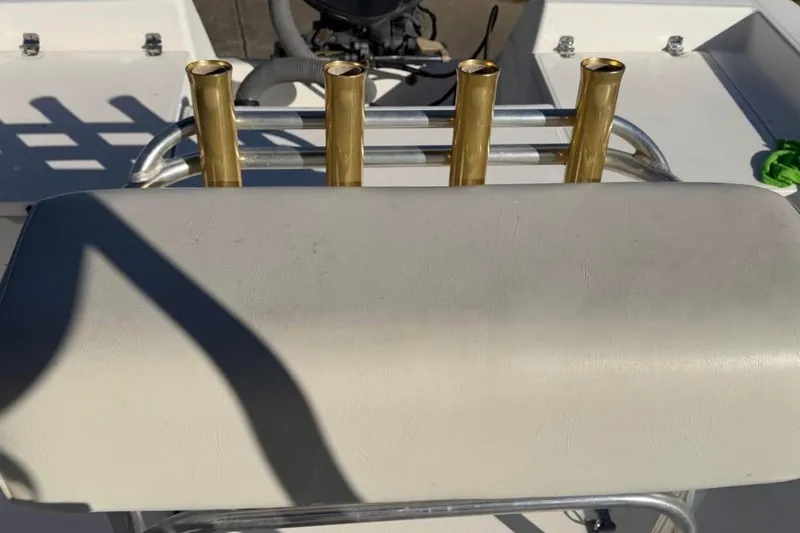 Slide: The Image of Boat seat with rod holders on a 2007 Century 2102 Inshore. - 8
