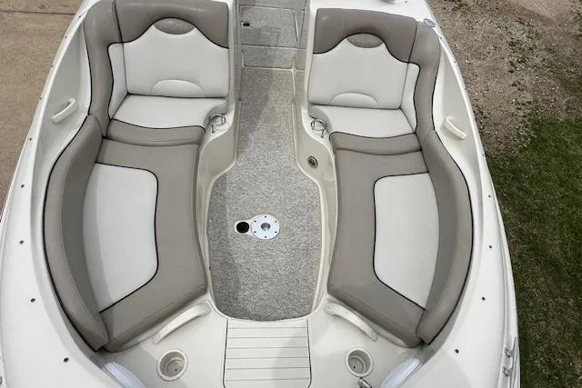 Slide: The Image of 2004 Sea Ray 270 Sundeck boat interior with spacious seating and elegant design. - 12