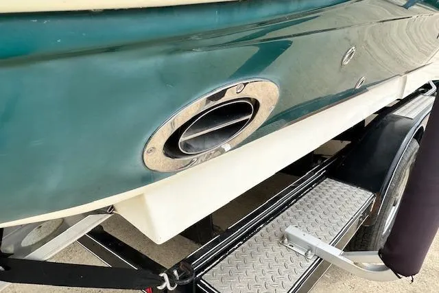 Slide: The Image of 2004 Sea Ray 270 Sundeck boat on trailer, close-up of exhaust port. - 9