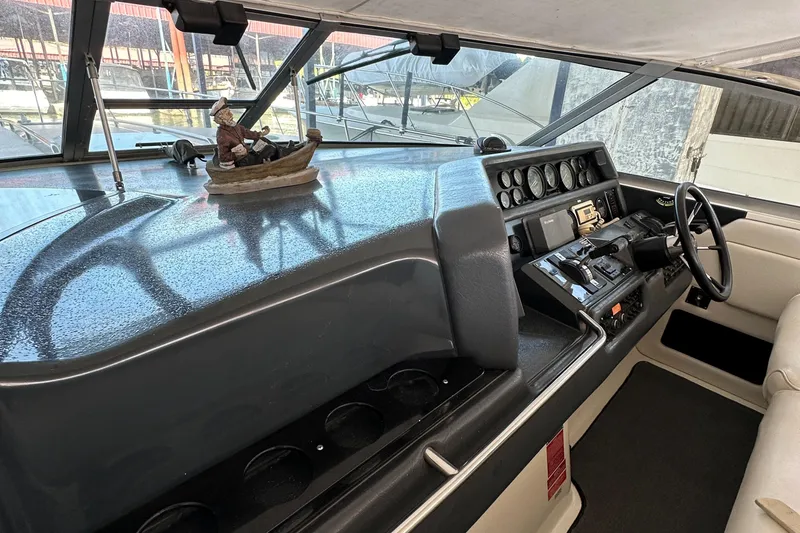 Slide: The Image of Interior view of 1993 Sea Ray Sundancer 370 cockpit. - 14
