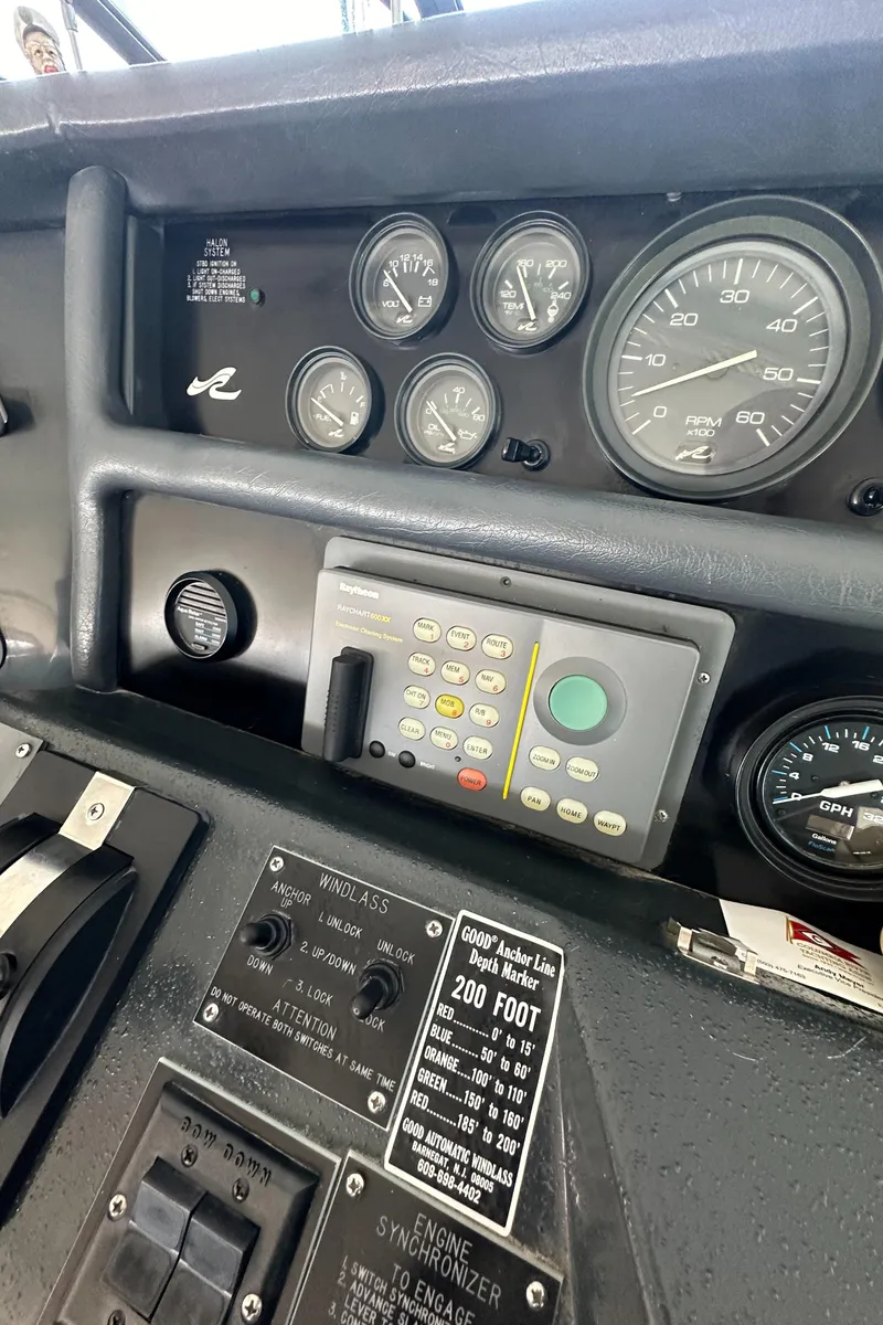 Slide: The Image of Dashboard of a 1993 Sea Ray Sundancer 370 boat with instruments. - 16