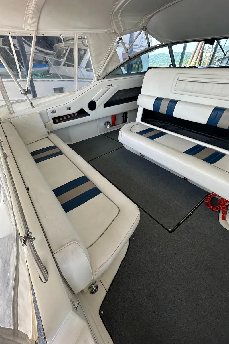 Slide: The Image of Interior of a 1993 Sea Ray Sundancer 370 with white seating. - 20
