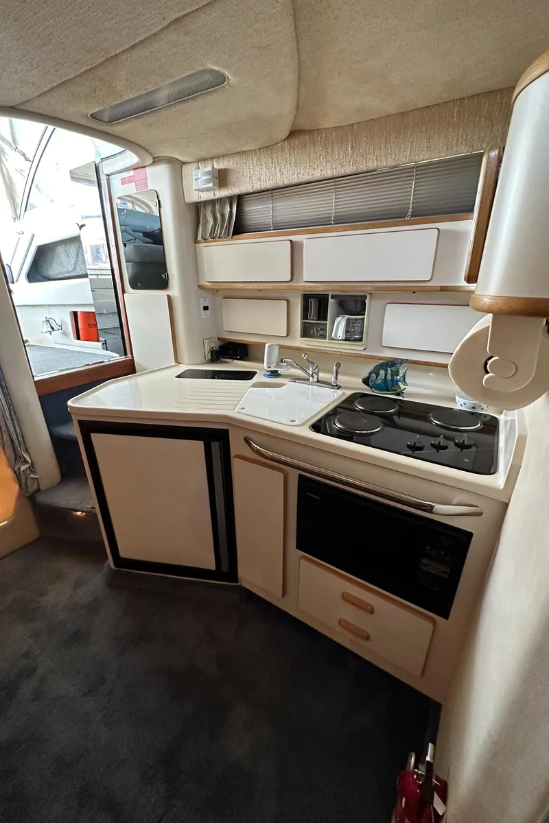Slide: The Image of Interior of 1993 Sea Ray Sundancer 370 yacht kitchen. - 25