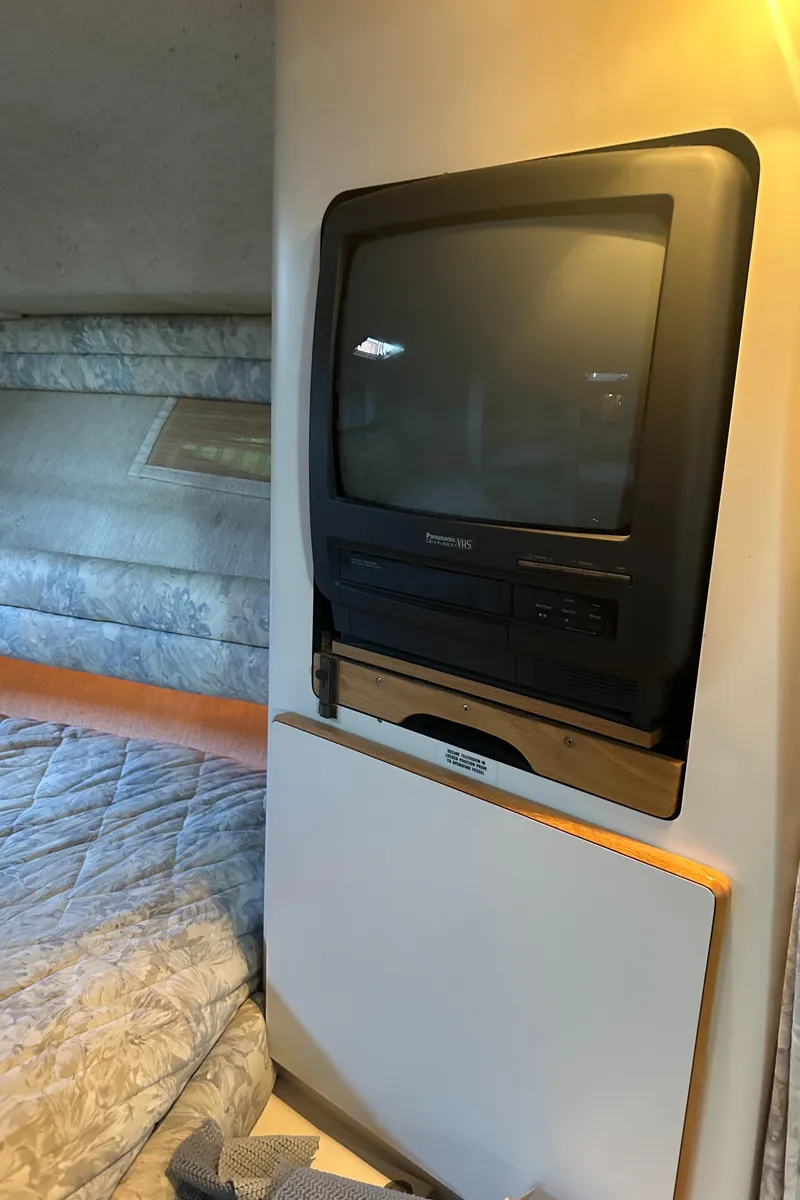 Slide: The Image of Interior of 1993 Sea Ray Sundancer 370 with built-in TV. - 27