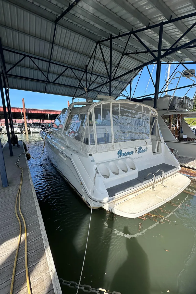 Slide: The Image of 1993 Sea Ray Sundancer 370 docked in covered marina. - 39