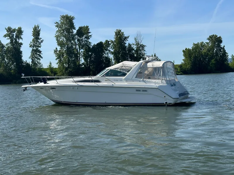 Slide: The Image of 1993 Sea Ray Sundancer 370 on calm water. - 41