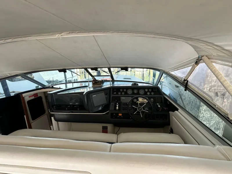 Slide: The Image of Interior of a 1993 Sea Ray Sundancer 370 yacht with helm console. - 7