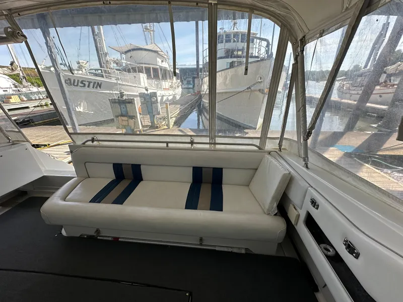 Slide: The Image of Interior of a 1993 Sea Ray Sundancer 370 yacht at the marina. - 8