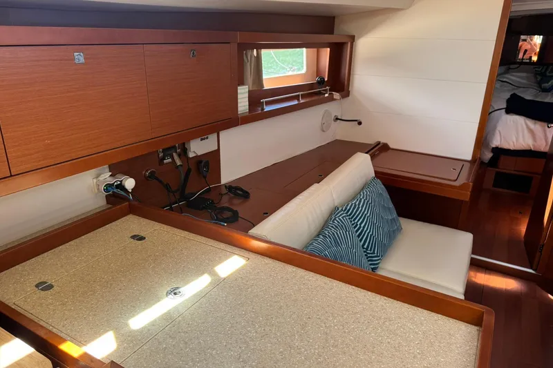 Slide: The Image of Cozy cabin interior of 2014 Beneteau Oceanis 45 yacht with comfortable bedding. - 22