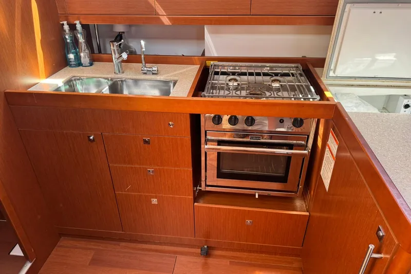 Slide: The Image of Cozy cabin interior of 2014 Beneteau Oceanis 45 sailboat with comfortable bedding. - 27