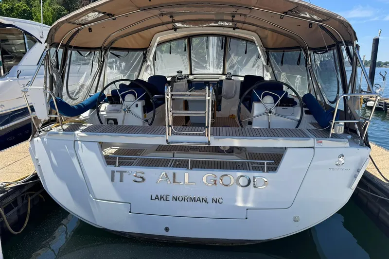 Slide: The Image of Beneteau Oceanis 45 sailboat, 2014 model, docked at Lake Norman with "It's All Good" name. - 3