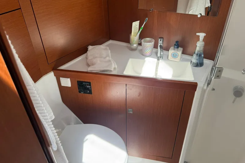 Slide: The Image of Galley kitchen in 2014 Beneteau Oceanis 45 yacht with stove and countertop. - 31
