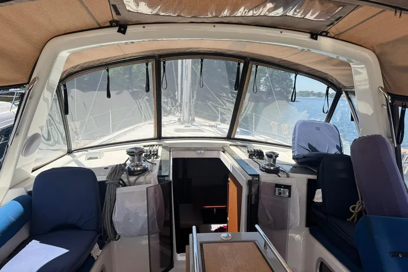 Slide: The Image of Interior view of 2014 Beneteau Oceanis 45 sailboat cockpit with seating and winches. - 8