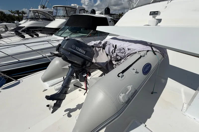 Slide: The Image of Inflatable boat with Yamaha motor on 1986 Bertram 46 Convertible yacht deck. - 65