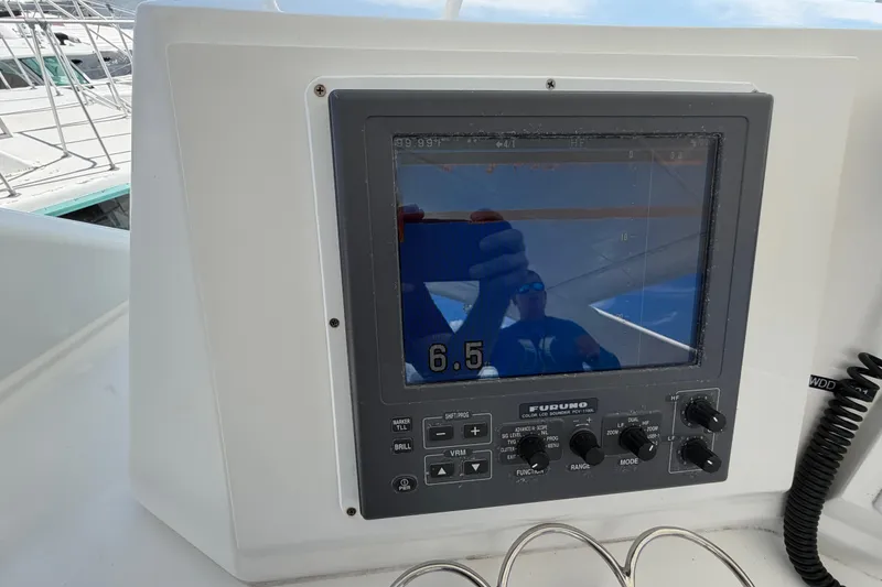 Slide: The Image of Furuno marine display on 1986 Bertram 46 Convertible yacht, showing depth reading. - 81