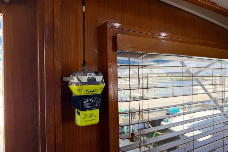 Slide: The Image of Emergency beacon mounted on a 1986 Bertram 46 Convertible yacht interior. - 98
