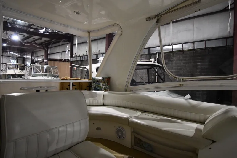 Slide: The Image of Interior of 2003 Cruisers Yachts 5000 Sedan Sport with white leather seating. - 26