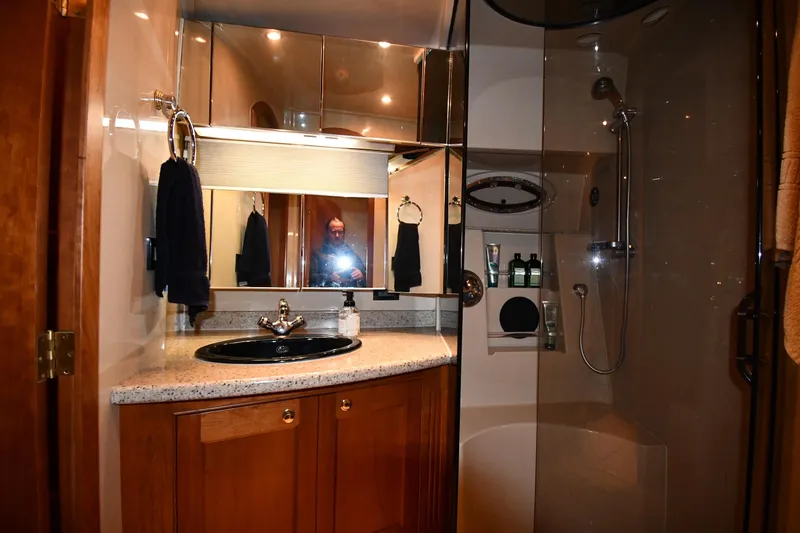 Slide: The Image of Luxurious bathroom in 2003 Cruisers Yachts 5000 Sedan Sport with modern fixtures. - 41