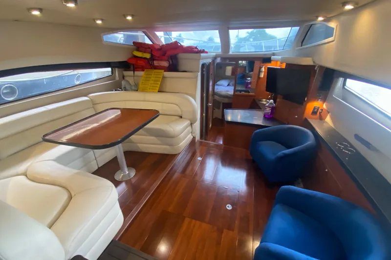 Slide: The Image of Luxurious interior of 2006 Regal Commodore 3880 yacht with plush seating and modern amenities. - 27