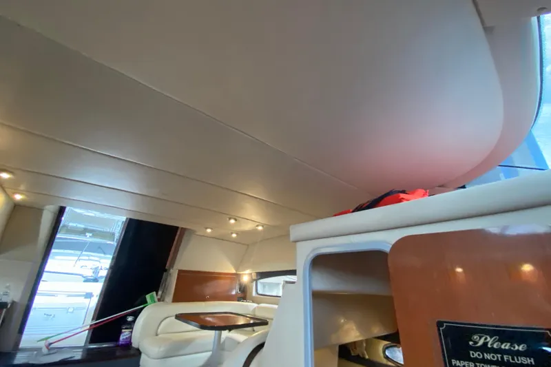 Slide: The Image of Interior of 2006 Regal Commodore 3880 yacht with seating and modern design elements. - 38