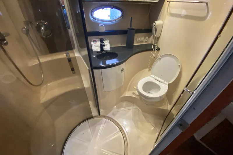 Slide: The Image of Bathroom interior of 2006 Regal Commodore 3880 yacht with shower and toilet. - 40