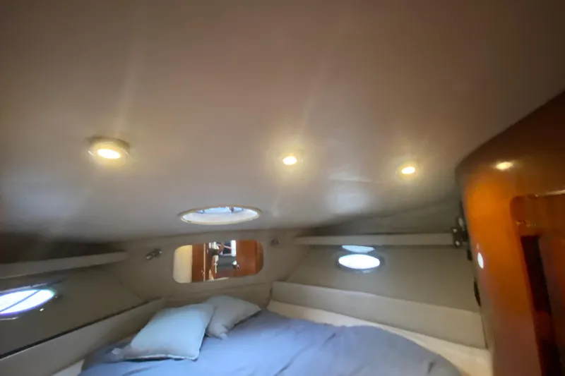 Slide: The Image of Cozy cabin interior of 2006 Regal Commodore 3880 yacht with ambient lighting. - 43