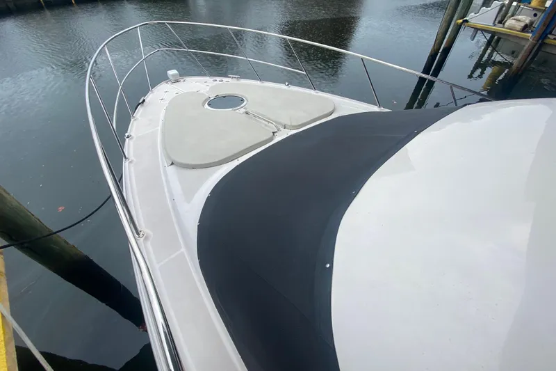 Slide: The Image of 2006 Regal Commodore 3880 yacht bow view at dockside. - 6