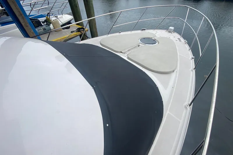 Slide: The Image of 2006 Regal Commodore 3880 yacht bow with railing and deck details. - 7