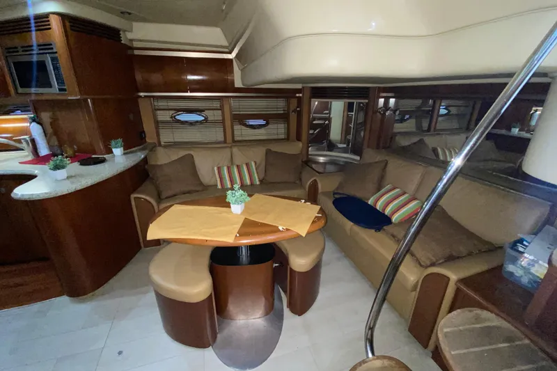 Slide: The Image of Luxurious interior of 2005 Sea Ray 500 Sundancer yacht with cozy seating and elegant decor. - 29