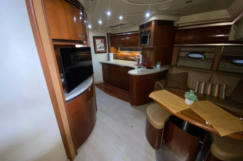 Slide: The Image of Luxurious interior of 2005 Sea Ray 500 Sundancer yacht with modern amenities and elegant design. - 30