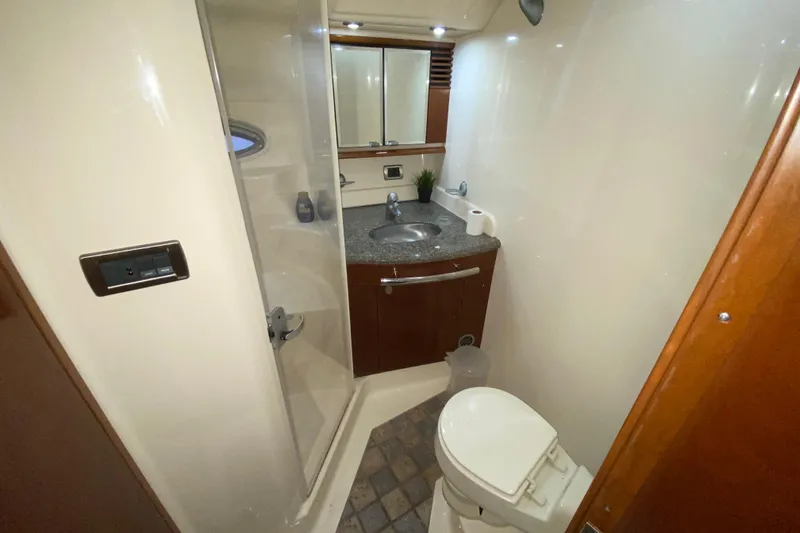 Slide: The Image of Luxurious bathroom in 2005 Sea Ray 500 Sundancer yacht with shower and vanity. - 34