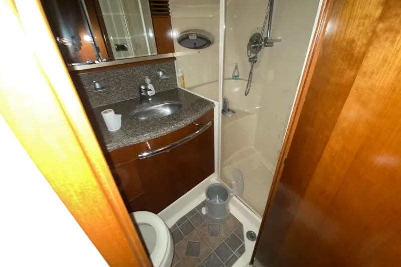 Slide: The Image of Bathroom interior of 2005 Sea Ray 500 Sundancer yacht with shower and sink. - 35