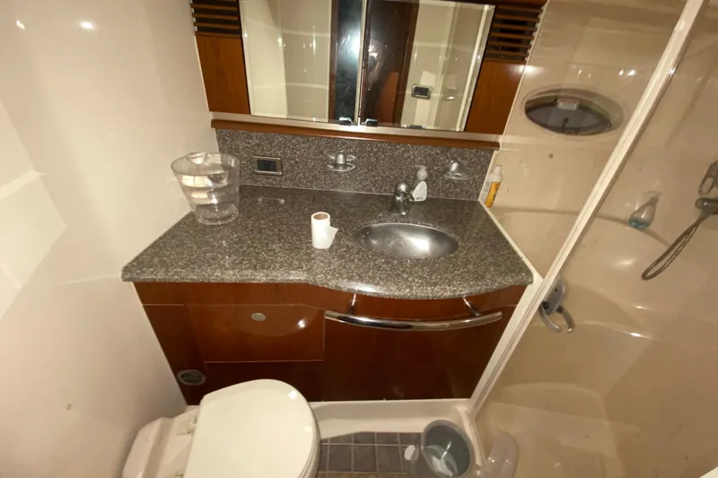 Slide: The Image of Luxurious bathroom in 2005 Sea Ray 500 Sundancer yacht with modern fixtures and shower. - 36