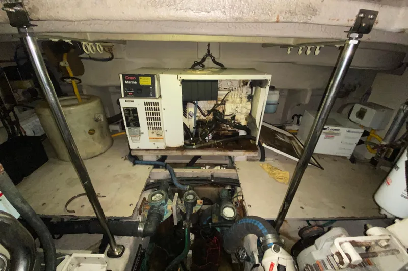 Slide: The Image of Engine room of a 2005 Sea Ray 500 Sundancer with Onan Marine generator. - 56