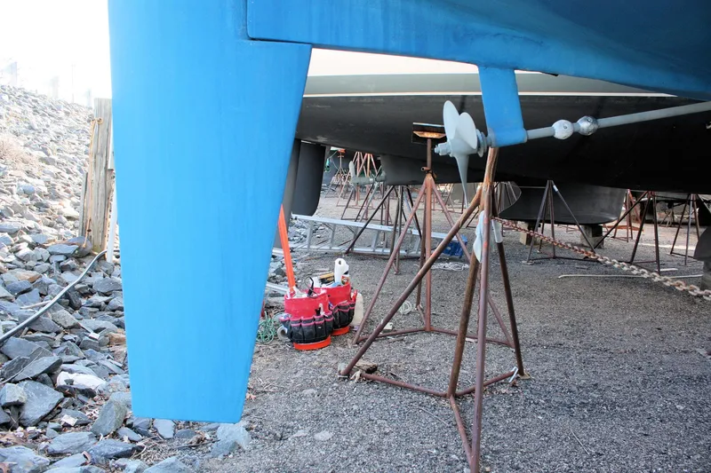 Slide: The Image of Catalina 36 sailboat from 1986 on stands, showing keel and propeller. - 15