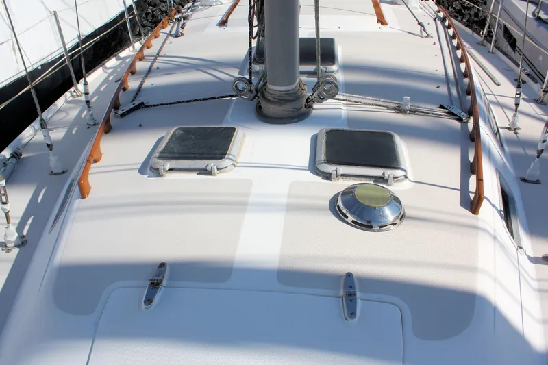 Slide: The Image of 1986 Catalina 36 sailboat deck with hatches and rigging details. - 21