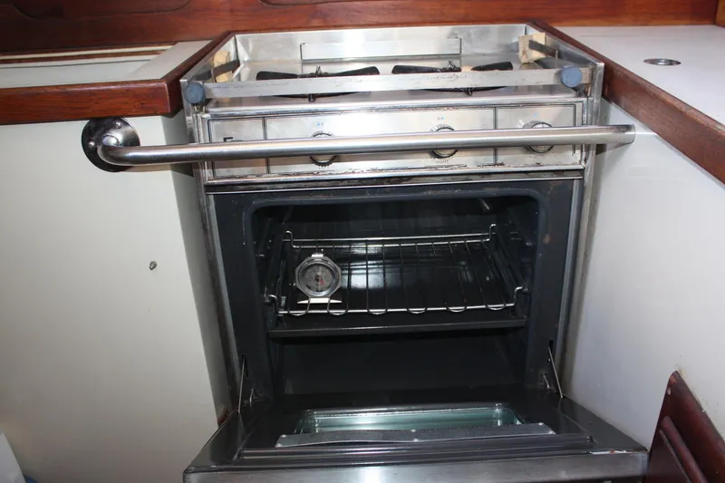 Slide: The Image of Stainless steel oven in a 1986 Catalina 36 yacht kitchen. - 54