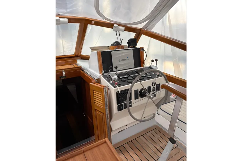Slide: The Image of Helm of 1990 Little Harbor 36 yacht with Garmin navigation system. - 3