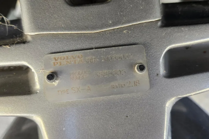 Slide: The Image of Close-up of a Volvo Penta engine plate on a 2019 Regal 2000 ES Bowrider. - 18