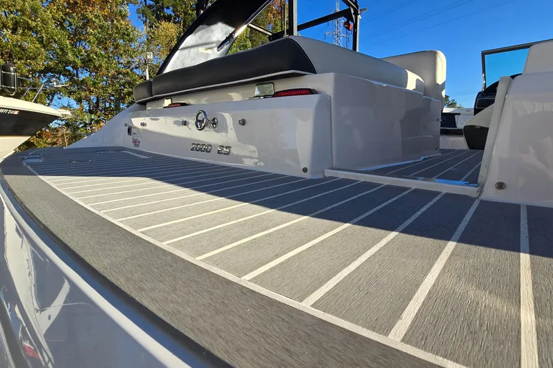 Slide: The Image of 2019 Regal 2000 ES Bowrider boat with sleek deck design and comfortable seating. - 20