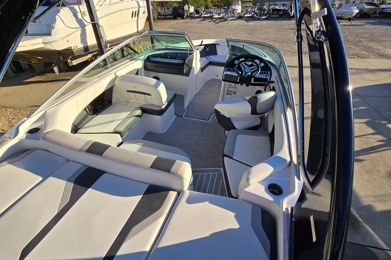 Slide: The Image of 2019 Regal 2000 ES Bowrider interior with sleek seating and modern dashboard design. - 24