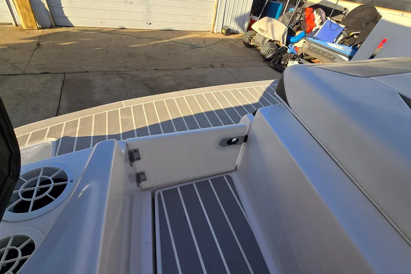 Slide: The Image of 2019 Regal 2000 ES Bowrider boat interior with sleek design and modern features. - 26