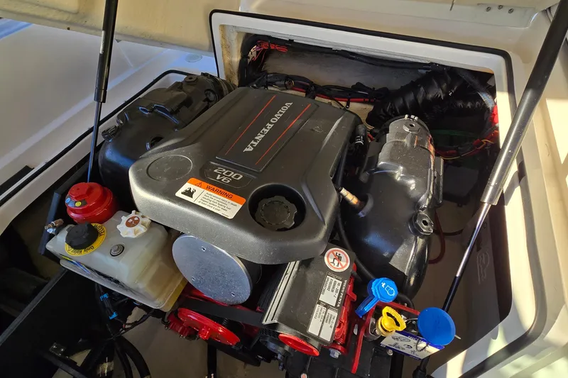 Slide: The Image of Engine compartment of a 2019 Regal 2000 ES Bowrider with Volvo Penta V6 engine. - 38
