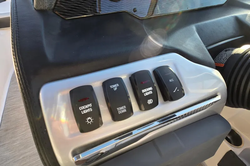 Slide: The Image of Control panel of 2019 Regal 2000 ES Bowrider with cockpit and docking light switches. - 44