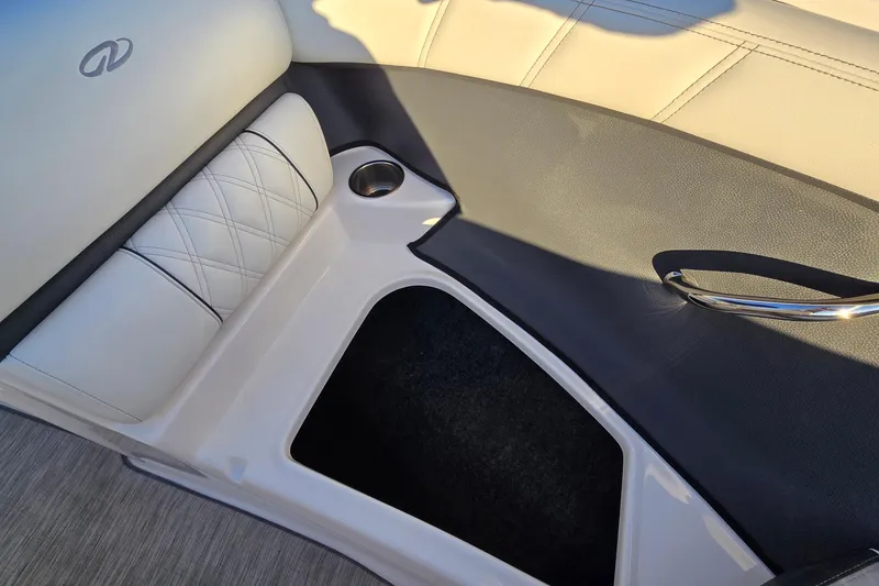 Slide: The Image of Interior of 2019 Regal 2000 ES Bowrider featuring cup holder and cushioned seating. - 50