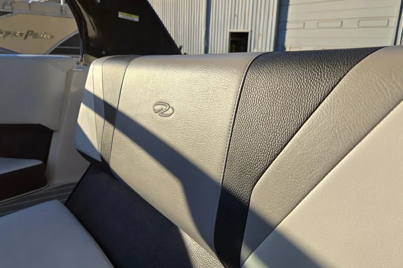 Slide: The Image of 2019 Regal 2000 ES Bowrider interior seat detail with logo, showcasing premium upholstery. - 62