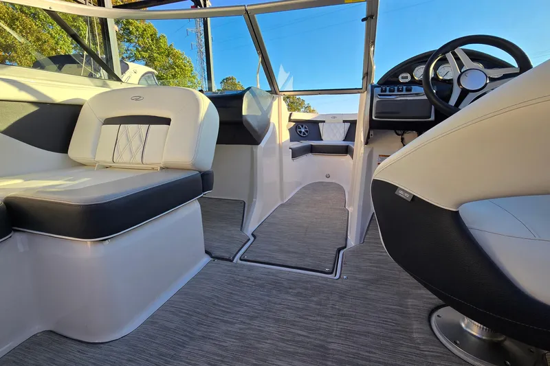Slide: The Image of 2019 Regal 2000 ES Bowrider interior with modern seating and steering wheel. - 64