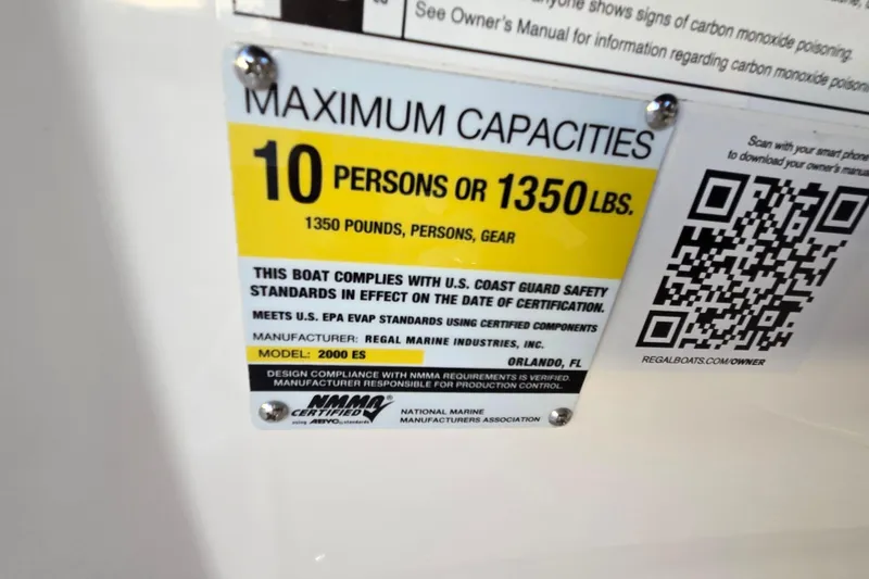Slide: The Image of 2019 Regal 2000 ES Bowrider capacity label, max 10 persons or 1350 lbs, safety compliance. - 65